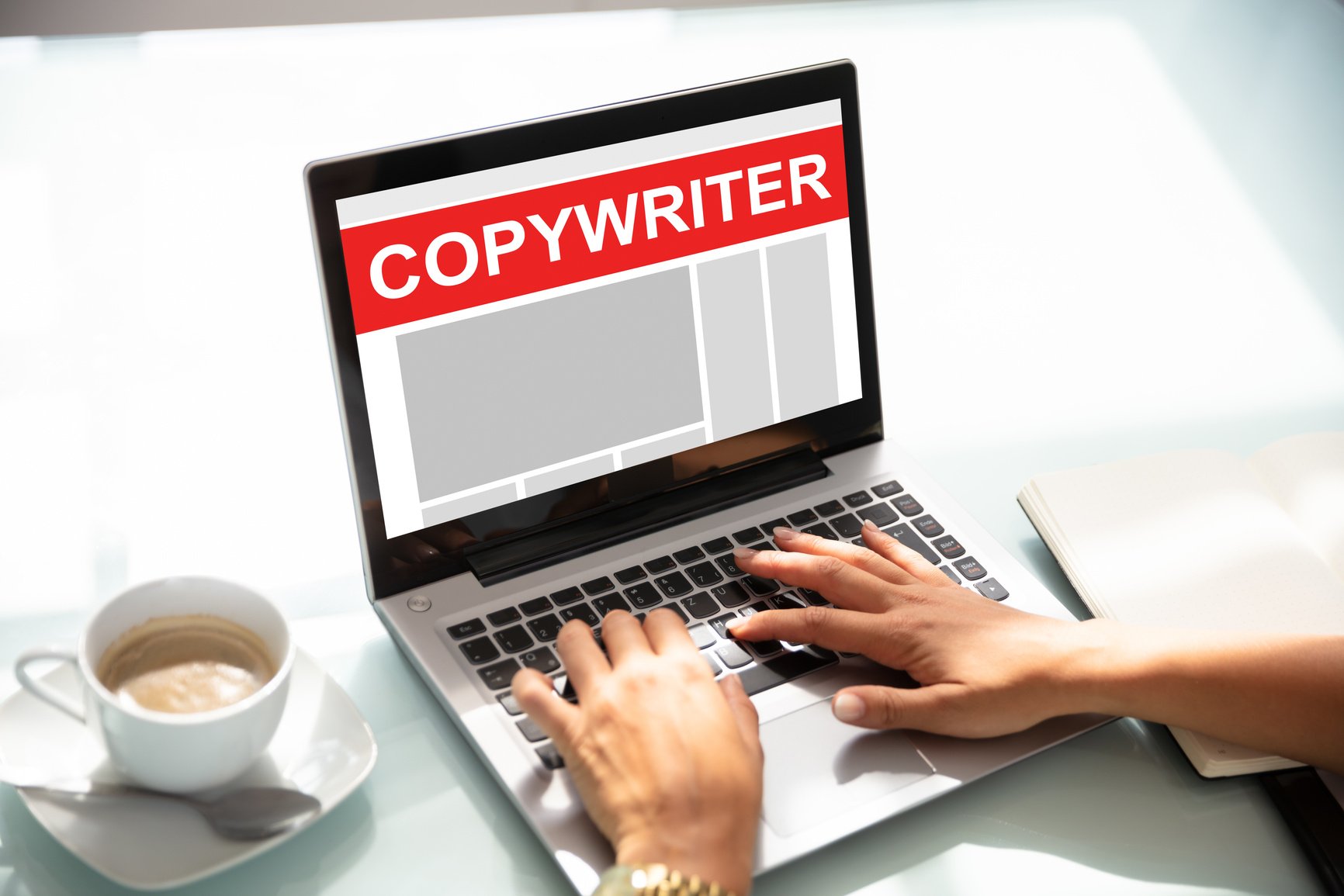 Copywriter Working On Laptop Writing Article